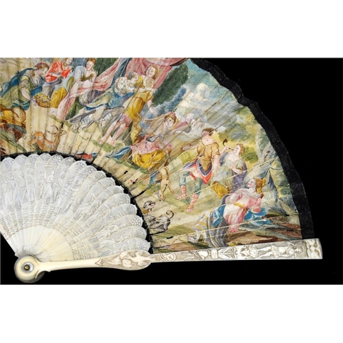 150 - λ An early 18th century ivory fan, with carved ivory guards and sticks, the guards with a most unusu... 