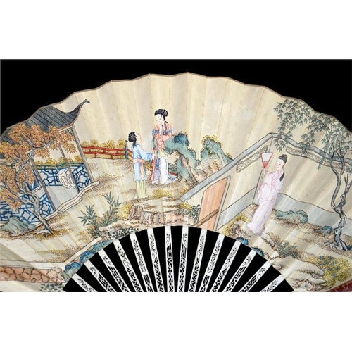 159 - λ An unusual possibly cinnabar lacquer and ivory fan, late 18th century, the bamboo guardsticks carv... 