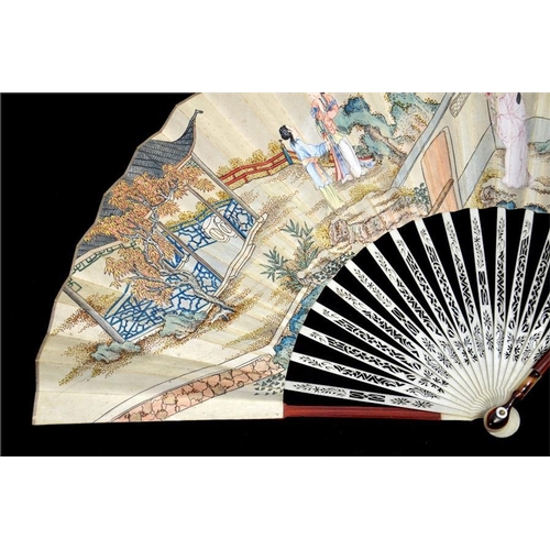 159 - λ An unusual possibly cinnabar lacquer and ivory fan, late 18th century, the bamboo guardsticks carv... 