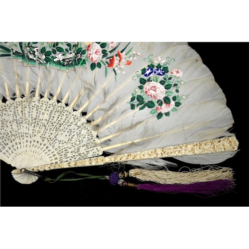 160 - λ A 19th century Chinese ivory and feather export fan, the guards profusely and deeply carved with o... 