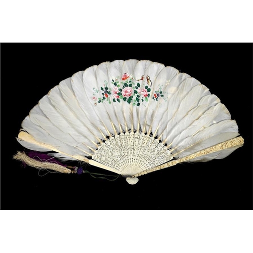 160 - λ A 19th century Chinese ivory and feather export fan, the guards profusely and deeply carved with o... 