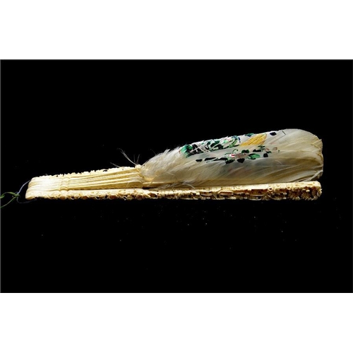 160 - λ A 19th century Chinese ivory and feather export fan, the guards profusely and deeply carved with o... 