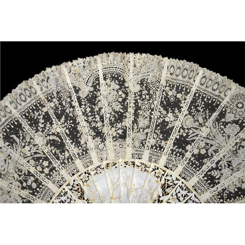 164 - λ A magnificent ivory and lace fan sculpted, carved and signed by Alfred Jorel, ornately carved with... 