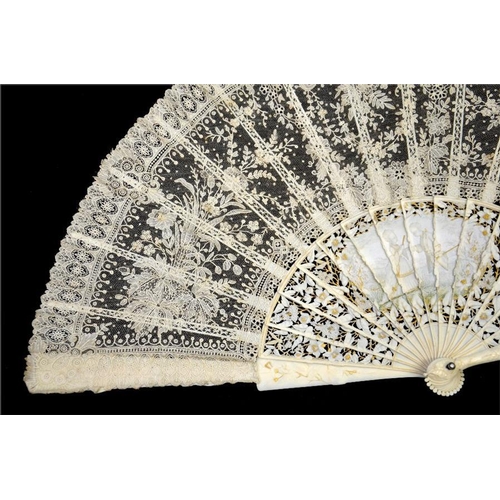 164 - λ A magnificent ivory and lace fan sculpted, carved and signed by Alfred Jorel, ornately carved with... 