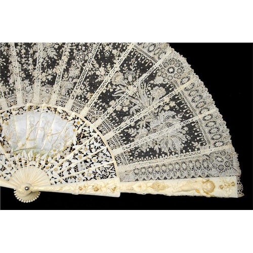 164 - λ A magnificent ivory and lace fan sculpted, carved and signed by Alfred Jorel, ornately carved with... 