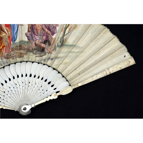 166 - λ An 18th century Ivory Biblical fan with plain ivory sticks and carved guards. The leaf is hand pai... 