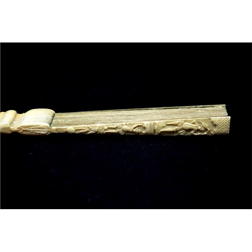 166 - λ An 18th century Ivory Biblical fan with plain ivory sticks and carved guards. The leaf is hand pai... 