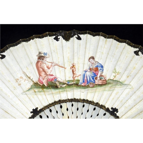 167 - λ An 18th century ivory fan with plain ivory sticks and guards. The leaf is hand painted with a pipe... 