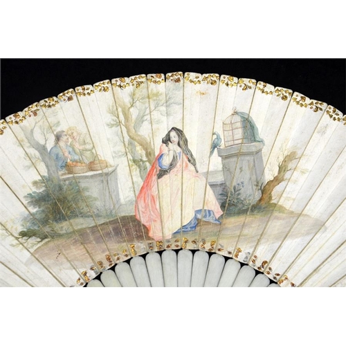 170 - λ An early 18th century ivory fan, with plain ivory sticks and guards, the guards with silver piqué ... 