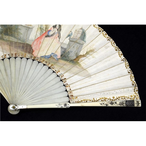 170 - λ An early 18th century ivory fan, with plain ivory sticks and guards, the guards with silver piqué ... 