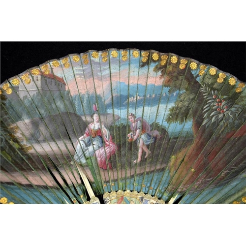 171 - λ A rare late 17th - early 18th century silk fan. The double silk leaf hand painted with an elegant ... 