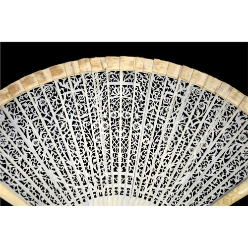 177 - λ An unusual early 18th century possibly Dutch ivory brisé fan, with carved guards and pierced stick... 