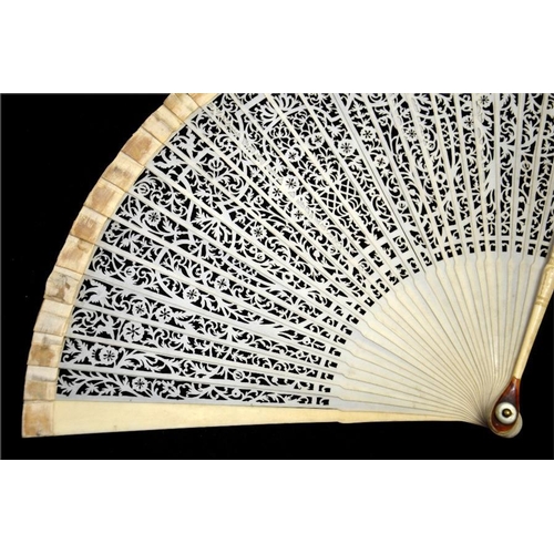 177 - λ An unusual early 18th century possibly Dutch ivory brisé fan, with carved guards and pierced stick... 