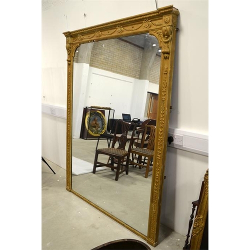 187 - A mid 19th century gilt framed overmantle mirror, with acanthus leaf decoration and floral swags. 20... 