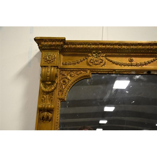 187 - A mid 19th century gilt framed overmantle mirror, with acanthus leaf decoration and floral swags. 20... 