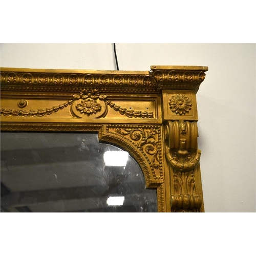 187 - A mid 19th century gilt framed overmantle mirror, with acanthus leaf decoration and floral swags. 20... 