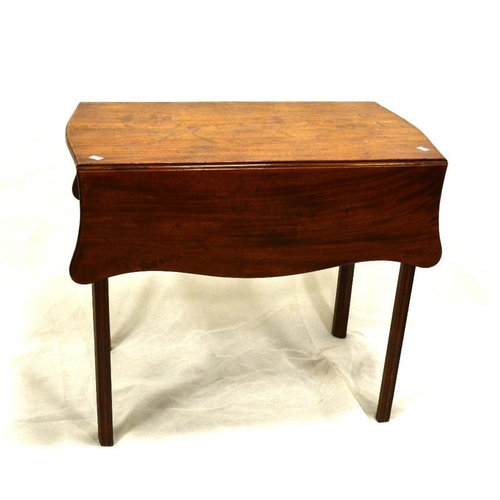 192 - A George III mahogany serpentine Pembroke table, butterfly drop leaf form, with fluted and pearl apr... 