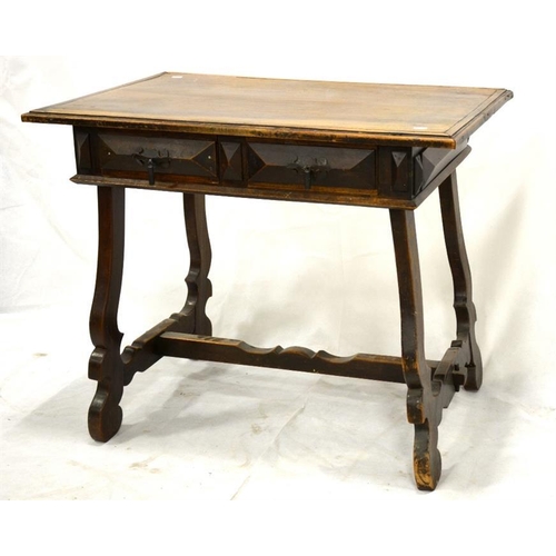 194 - An Iberian walnut two drawer side table, 17th century style, trestle form with steel handles, 97cm w... 