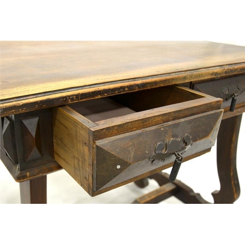 194 - An Iberian walnut two drawer side table, 17th century style, trestle form with steel handles, 97cm w... 