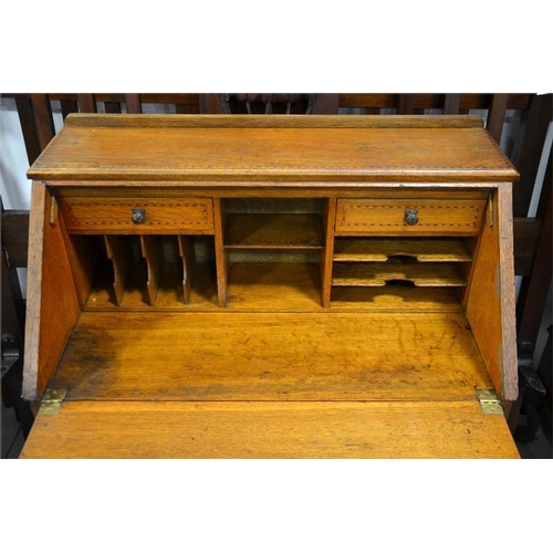 199 - A Wylie and Lockhead bureau, with checker board border and an Art Nouveau inlay on front, with key, ... 