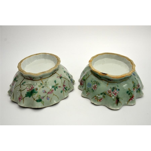 27 - A pair of Chinese famille rose footed dishes, 19th century, celadon glazed and enamelled with grassh... 