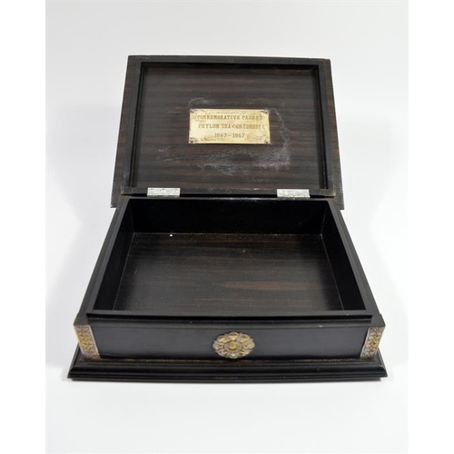 37 - A commemorative ebonised casket for the 'Ceylon Tea Centenary 1867 - 1967' with white metal mounts, ... 