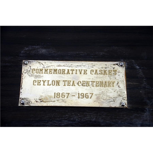 37 - A commemorative ebonised casket for the 'Ceylon Tea Centenary 1867 - 1967' with white metal mounts, ... 