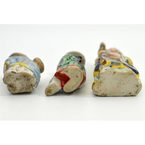 40 - Three Chinese porcelain snuff bottles, each modelled as a figure, polychrome decorated, including ma... 