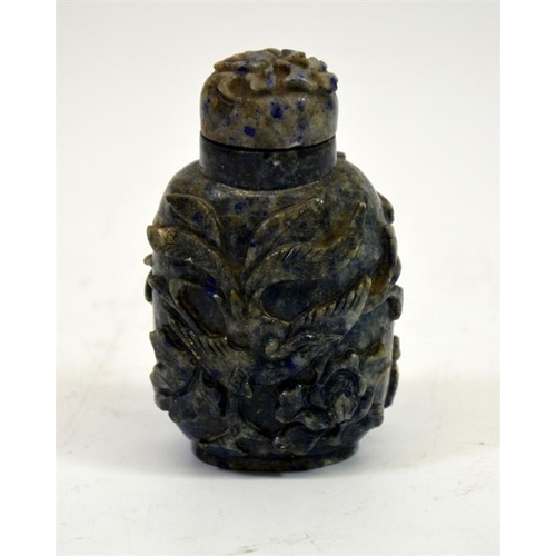 63 - A Chinese carved Lapis snuff bottle, bird of paradise and foliate design