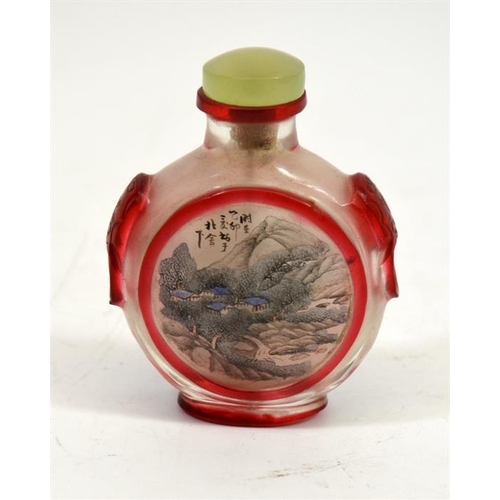 64 - A Chinese glass snuff bottle, reverse painted and cameo engraved, moonflask form