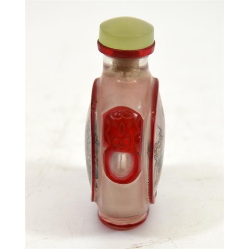 64 - A Chinese glass snuff bottle, reverse painted and cameo engraved, moonflask form