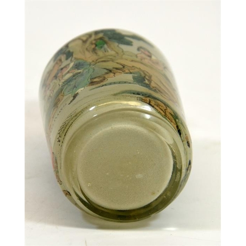 67 - A Chinese glass snuff bottle, cylindrical form, reverse painted with courtiers playing games in a ga... 