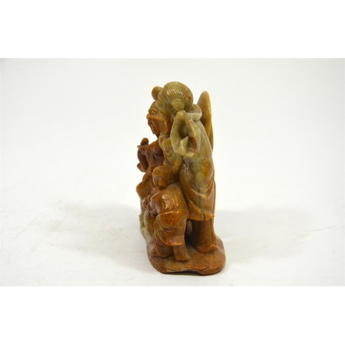 71 - A Chinese carved hardstone figure group of elders with a boy, 9cm high