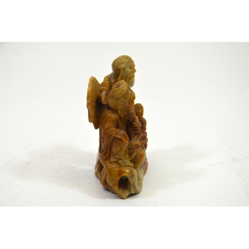 71 - A Chinese carved hardstone figure group of elders with a boy, 9cm high