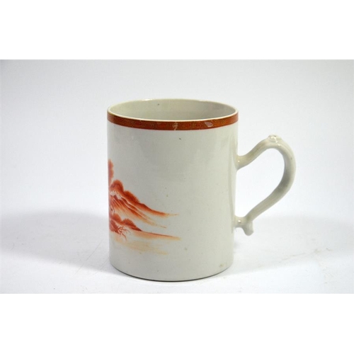 73 - A Japanese monochrome painted tankard, 18th century, orange landscape below gilt key border, 12cm hi... 