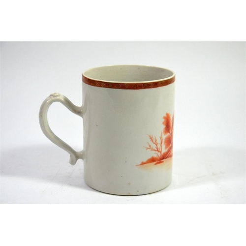 73 - A Japanese monochrome painted tankard, 18th century, orange landscape below gilt key border, 12cm hi... 