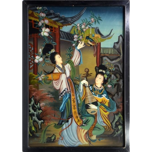 75 - A pair of Chinese reverse painted glass pictures, depicting women in garden scenes with peonies, 66c... 