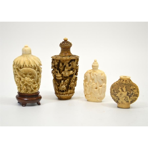 76 - Four Chinese snuff bottles, including three 19th century carved ivory examples, dragons, landscapes ... 