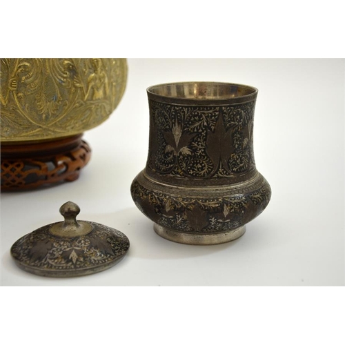 79 - An Indian gilt brass cast bowl, together with niello white metal baluster vase and covered pot, bowl... 