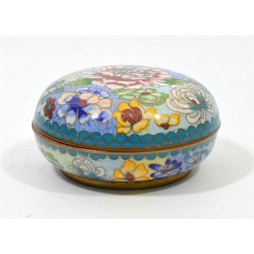 85 - An Oriental cloisonne enamelled box, decorated with chrysanthemums, 8cm diameter