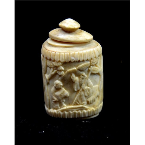 91 - A Chinese carved bone snuff bottle, 19th century, decorated in the round with elders in a garden lan... 