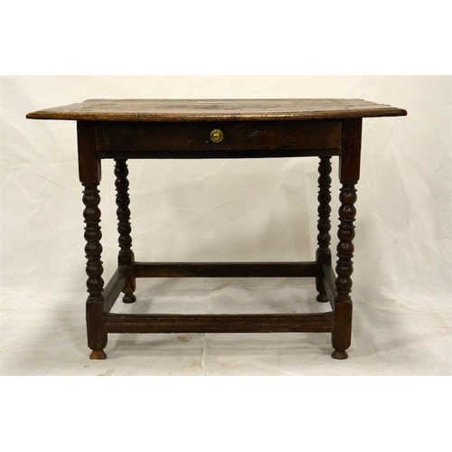 227 - A Charles II oak single drawer side table, joined construction, on cup and ball turned legs, 94cm wi... 