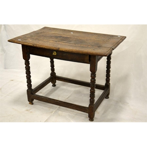 227 - A Charles II oak single drawer side table, joined construction, on cup and ball turned legs, 94cm wi... 