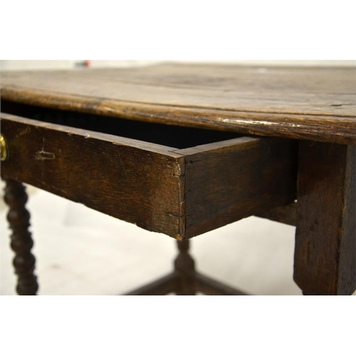 227 - A Charles II oak single drawer side table, joined construction, on cup and ball turned legs, 94cm wi... 