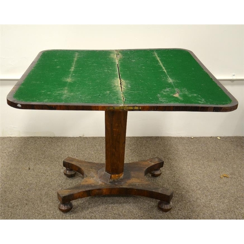 239 - A William IV rosewood foldover pedestal card table, swivel topped, on tapered octagonal support and ... 