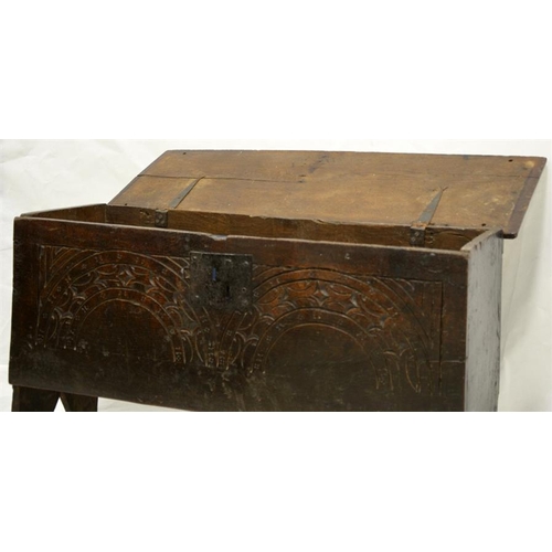 247 - A 17th century style oak boarded chest, probably 18th century, the carved double arcaded front with ... 