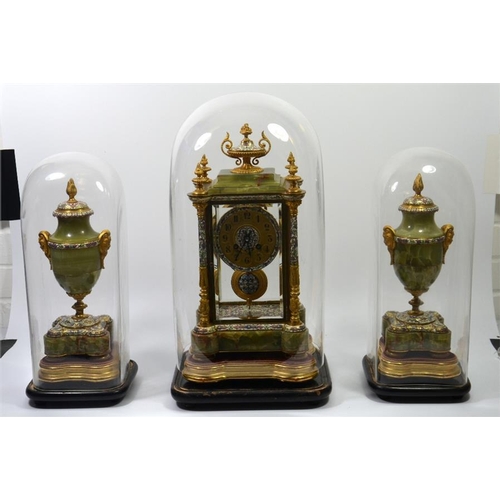 279 - A French champleve enamel, ormolu and onyx clock garniture, under glass domes, the Japy Freres movem... 