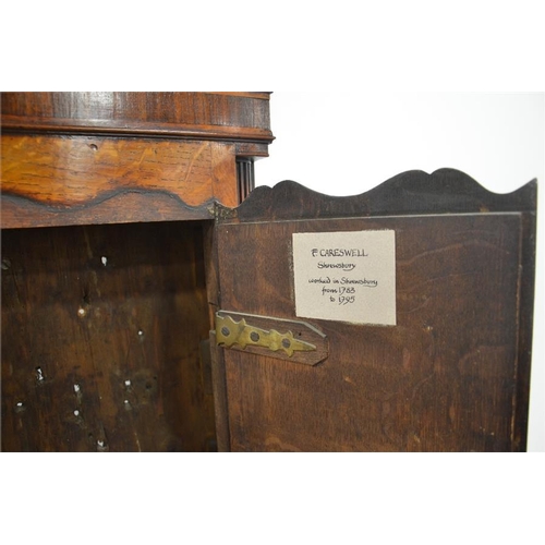 280 - A George III oak and mahogany cross banded longcase clock, F Careswell, Shrewsbury, brass dial below... 