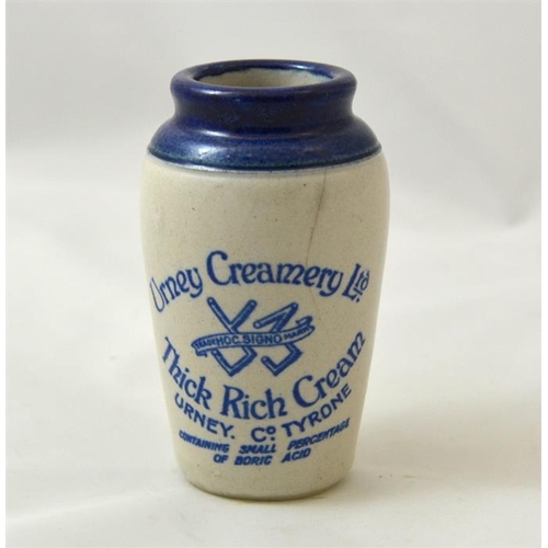 509 - A blue top cream pot from the Urney Creamery Ltd County Tyrone 11cm high.