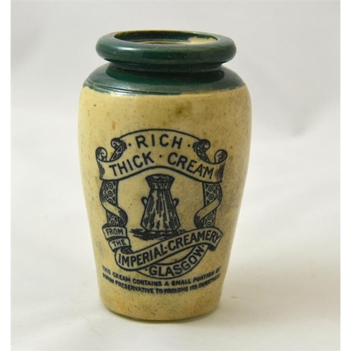 511 - A green top cream pot from the Imperial Creamery Glasgow 11.5cm high.